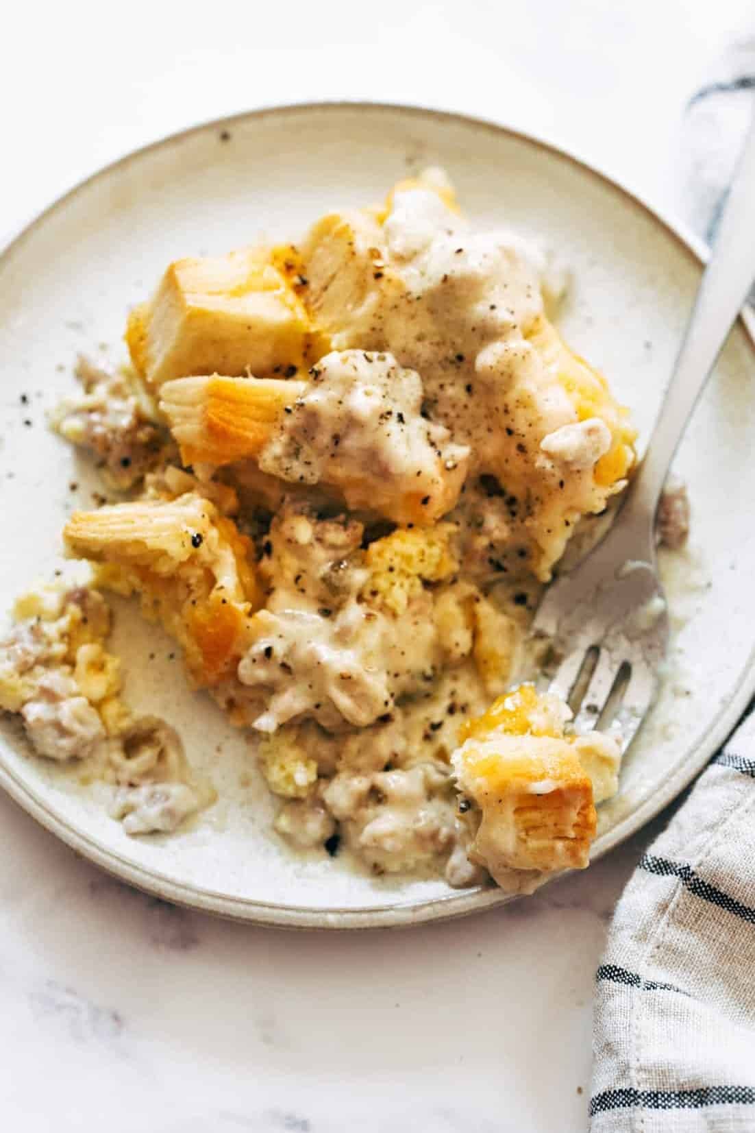 Biscuits and gravy egg bake on a plate.